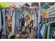 Organized walk-in closet with an abundance of hanging and shelf space for clothing and accessories at 144 Boones Ridge Se Pkwy, Acworth, GA 30102