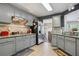 Well-appointed kitchen with stainless steel appliances, granite countertops, tile backsplash, and open layout at 144 Boones Ridge Se Pkwy, Acworth, GA 30102