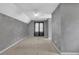 Bright bedroom featuring gray walls, carpeted floor, and a ceiling fan at 1930 Huntcliff Dr, Lawrenceville, GA 30043