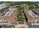 Aerial view showcases a well-planned community with ample parking and diverse buildings nestled among mature trees at 2172 Peach Se Ln, Smyrna, GA 30080