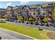 Attractive exterior of community buildings with parking and shops, enhanced by balconies and lush landscaping at 2172 Peach Se Ln, Smyrna, GA 30080