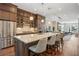 Spacious kitchen with center island, stainless appliances and hardwood floors at 2172 Peach Se Ln, Smyrna, GA 30080