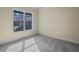 Bright and airy bedroom with neutral carpet, base trim, and large window offering great natural light at 3204 Ivy Farm Path, Buford, GA 30519