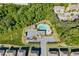 Aerial view of a community pool surrounded by lush greenery, offering a refreshing escape for residents at 3204 Ivy Farm Path, Buford, GA 30519