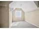 Spacious walk-in closet with carpet flooring, a window, and multiple levels of shelving at 3204 Ivy Farm Path, Buford, GA 30519