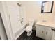 Clean bathroom featuring a modern vanity and shower-tub combination at 3800 Travis Trce, Decatur, GA 30032