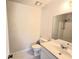 Well-lit bathroom featuring a modern vanity and shower-tub combination at 3800 Travis Trce, Decatur, GA 30032