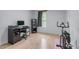 Bedroom with hardwood floors and space for home office and exercise area at 466 Victoria Rd, Woodstock, GA 30189
