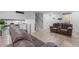 Bright living room with hardwood floors and large windows, offering a comfortable space for relaxation and entertainment at 466 Victoria Rd, Woodstock, GA 30189