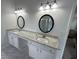 Bathroom featuring double vanity with granite counters at 525 Dunagan Dr, Lawrenceville, GA 30045
