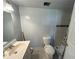 Bathroom featuring a sink and toilet at 525 Dunagan Dr, Lawrenceville, GA 30045