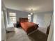 Bedroom with neutral carpet, walk-in closet and natural light at 525 Dunagan Dr, Lawrenceville, GA 30045
