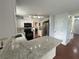 Bright kitchen features granite countertops, sleek appliances, and ample counter space for cooking at 525 Dunagan Dr, Lawrenceville, GA 30045