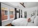 Bright bedroom featuring natural light, wood floors, and neutral color scheme for a cozy atmosphere at 653 N Highland Ne Ave # 3, Atlanta, GA 30306