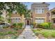 Charming two-story brick home with landscaped front yard and inviting front entrance at 653 N Highland Ne Ave # 3, Atlanta, GA 30306