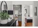 Stylish hallway with hardwood floors leading to the kitchen and bedroom at 653 N Highland Ne Ave # 3, Atlanta, GA 30306