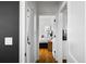 Hallway showcasing the home's layout, leading to a bedroom and other living spaces at 653 N Highland Ne Ave # 3, Atlanta, GA 30306