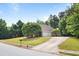 Well-maintained home with lush lawn and mature trees at 221 The Esplanade Se Way, Loganville, GA 30052