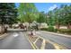 Community entrance featuring a gated entry and signage for The Cottages at Baker Road at 4922 Carson Glen Ln, Acworth, GA 30101