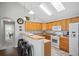 Kitchen featuring a breakfast bar, skylight, and stainless steel appliances at 4922 Carson Glen Ln, Acworth, GA 30101