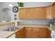 Cozy kitchen with stainless sink, cabinets, and laminate counter at 4922 Carson Glen Ln, Acworth, GA 30101