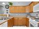 Kitchen features wood cabinets and a stainless steel sink at 4922 Carson Glen Ln, Acworth, GA 30101