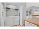 Laundry room with appliances, plenty of storage, and counter space at 4922 Carson Glen Ln, Acworth, GA 30101