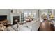 Inviting living room featuring a fireplace, comfortable seating, and elegant decor at 4922 Carson Glen Ln, Acworth, GA 30101