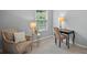 Bright office area with a comfortable chair, desk, and window at 4922 Carson Glen Ln, Acworth, GA 30101