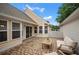 Outdoor patio features stone pavers, seating, sliding glass door, and lots of light at 4922 Carson Glen Ln, Acworth, GA 30101