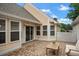 Outdoor patio features stone pavers, seating, sliding glass door, and lots of light at 4922 Carson Glen Ln, Acworth, GA 30101