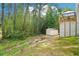 Spacious backyard with shed and access to the upper deck area at 1010 Capella Creek Way, Grayson, GA 30017