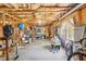 Unfinished basement featuring exposed ceiling with framing, windows and ample space for storage and various activities at 1010 Capella Creek Way, Grayson, GA 30017