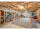 Spacious unfinished basement with exposed ceiling and wood framing offering potential for customization and storage at 1010 Capella Creek Way, Grayson, GA 30017