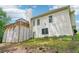 Rear exterior featuring a deck with outdoor seating, and home's siding at 1010 Capella Creek Way, Grayson, GA 30017