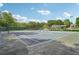 Well-maintained community tennis courts and surrounding green space at 1010 Capella Creek Way, Grayson, GA 30017