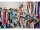 Spacious walk-in closet with ample shelving and rods for maximum storage at 1010 Capella Creek Way, Grayson, GA 30017