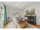 Spacious dining room with stylish decor, hardwood floors and modern chandelier at 1634 Glenwood Se Ave, Atlanta, GA 30316