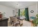 Elegant dining room with hardwood floors, modern lighting, and neutral décor at 1634 Glenwood Se Ave, Atlanta, GA 30316