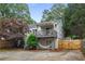Charming home featuring a second-story covered patio, a spacious yard, and a convenient outdoor hammock area at 1634 Glenwood Se Ave, Atlanta, GA 30316