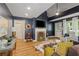 Comfortable living room with a vaulted ceiling, fireplace, and natural light, perfect for relaxation and entertainment at 1634 Glenwood Se Ave, Atlanta, GA 30316