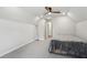 Bedroom featuring neutral colors, slanted ceiling, and comfortable gray carpet at 1712 Shirley Sw St, Atlanta, GA 30310