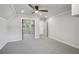 Neutral bedroom with mirrored closet doors and light gray carpet at 1712 Shirley Sw St, Atlanta, GA 30310