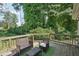 Cozy outdoor deck furnished with a seating arrangement, perfect for relaxation and enjoying nature at 1712 Shirley Sw St, Atlanta, GA 30310