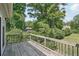 Wooden deck overlooking a lush backyard and green trees at 1712 Shirley Sw St, Atlanta, GA 30310
