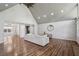 Open living area with vaulted ceilings, wood floors, and a neutral color palette with lots of space at 1712 Shirley Sw St, Atlanta, GA 30310