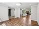 Open living room area with hardwood flooring, recessed lighting, and high ceilings at 1712 Shirley Sw St, Atlanta, GA 30310
