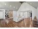 Spacious living room with wood floors, neutral walls, vaulted ceilings, and lots of natural light at 1712 Shirley Sw St, Atlanta, GA 30310