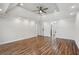 Spacious main bedroom featuring wood floors, recessed lighting, and ceiling fan at 1712 Shirley Sw St, Atlanta, GA 30310