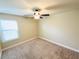 Cozy bedroom with carpet and a large window allowing natural light at 2378 Misty Ivy Ct, Buford, GA 30519
